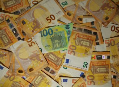 A pile of 50 euro bills sitting on top of each other